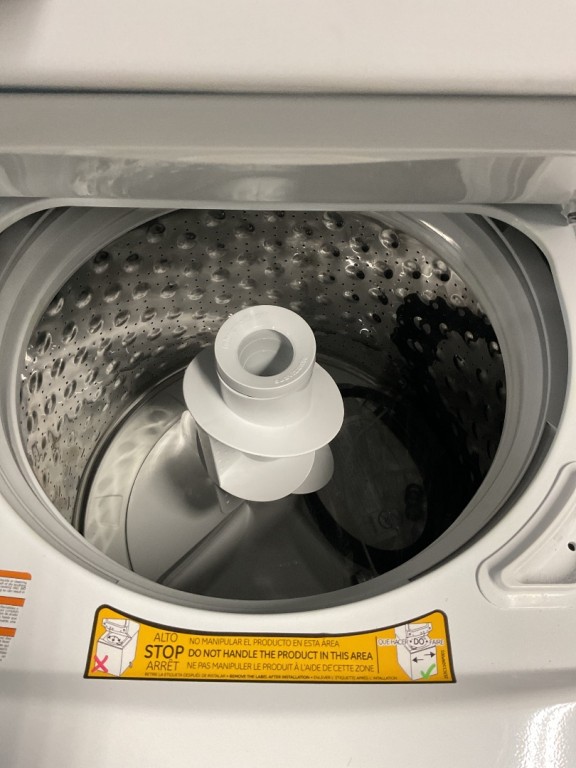 GE Unitized Spacemaker 3.8 cu. ft. Capacity Washer with Stainless Steel Basket and 5.9 cu. ft. Capacity Gas Dryer White on White GUD27GSSMWW