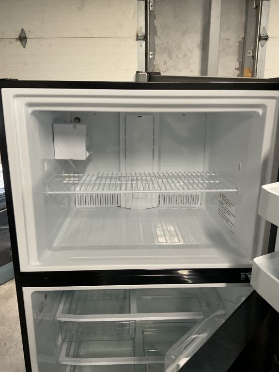 GE 21.1 Cu. Ft. Top-Freezer Refrigerator Black GIE21GTHBB, product image 3 of 6